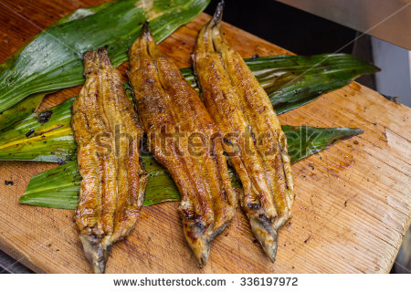 stock-photo-roasted-eel-on-palm-leaf-japanese-cuisine-336197972
